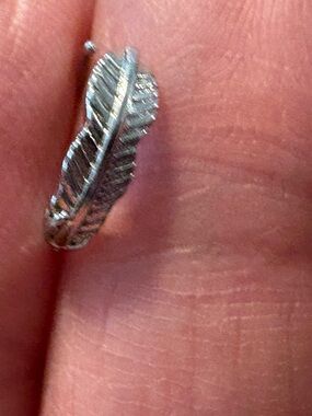 Nose Ring- 20 G Cuff/Clip Nose Ring. Stainless Steel , in silver tone.